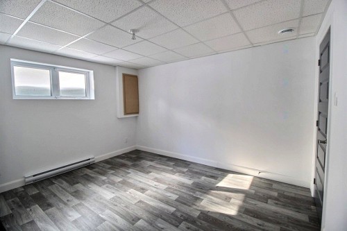 Chambre à coucher - 121 Rue Frédéric, Saguenay (Chicoutimi), QC - Indoor Photo Showing Other Room