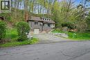 Split-level home featuring a stone facade and siding exterior - 1333 Hidden Valley Road, Burlington, ON  - Outdoor 