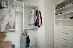 Primary walk-in closet - 
