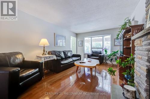7220 Danton Promenade, Mississauga, ON - Indoor Photo Showing Living Room With Fireplace
