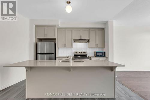 34 Queenpost Drive E, Brampton, ON - Indoor Photo Showing Kitchen With Double Sink With Upgraded Kitchen