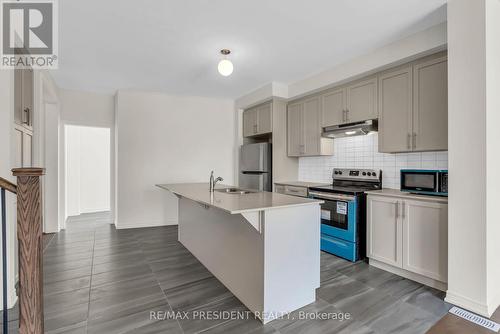 34 Queenpost Drive E, Brampton, ON - Indoor Photo Showing Kitchen With Double Sink