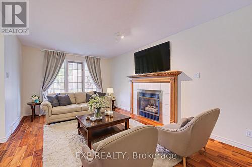 225 Dartmoor Crescent, Waterloo, ON - Indoor Photo Showing Living Room With Fireplace
