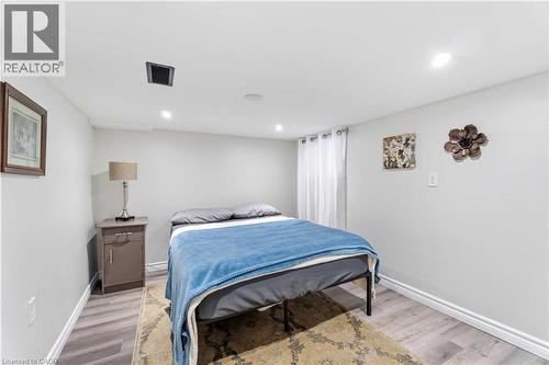 Room featuring recessed lighting, a ceiling vent, and light wood-finish flooring - 74 Province Street N, Hamilton, ON - Indoor Photo Showing Bedroom