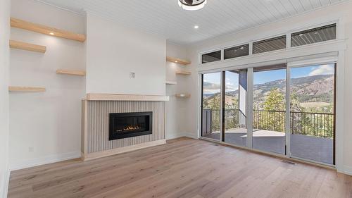 2140 Montenegro Drive, Kelowna, BC - Indoor With Fireplace