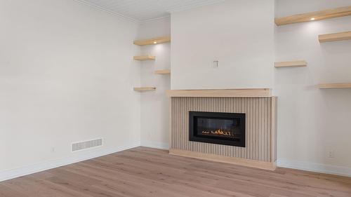2140 Montenegro Drive, Kelowna, BC - Indoor With Fireplace