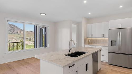 2140 Montenegro Drive, Kelowna, BC - Indoor Photo Showing Kitchen With Double Sink With Upgraded Kitchen
