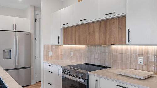 2140 Montenegro Drive, Kelowna, BC - Indoor Photo Showing Kitchen With Upgraded Kitchen
