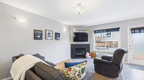 1516 20Th Avenue, Cranbrook, BC - Indoor Photo Showing Living Room With Fireplace