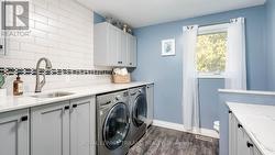 Updated main floor laundry room. - 