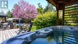 Private hot tub in the backyard. - 