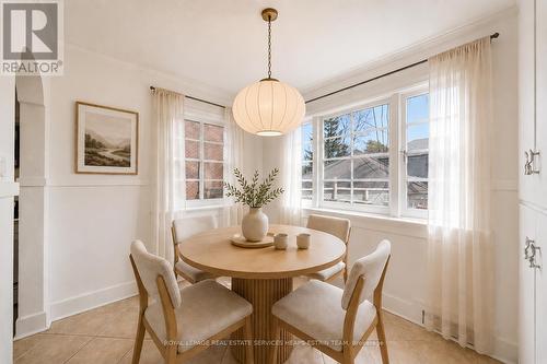 Virtually Staged - 61 Sutherland Drive, Toronto, ON - Indoor Photo Showing Dining Room