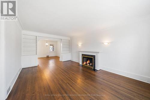 61 Sutherland Drive, Toronto, ON - Indoor Photo Showing Living Room With Fireplace