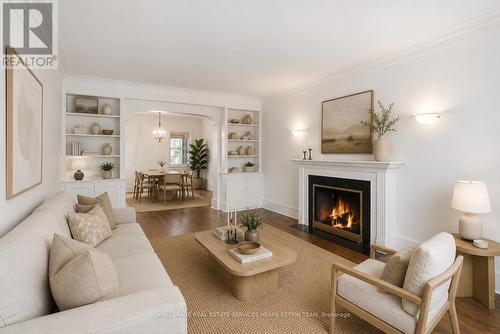 Virtually Staged - 61 Sutherland Drive, Toronto, ON - Indoor Photo Showing Living Room With Fireplace