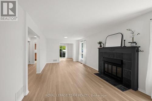 93 Hewitt Way, Ottawa, ON - Indoor Photo Showing Living Room With Fireplace