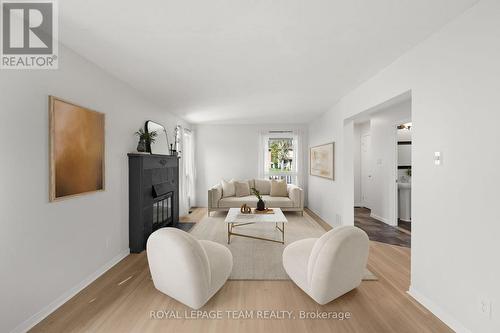 This living room has been virtually staged. - 93 Hewitt Way, Ottawa, ON - Indoor Photo Showing Living Room