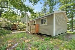 Back of Cottage and stairs to Bunkie - 
