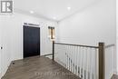 Entry, foyer, stairs to basement - 49 Beaufort Crescent, Tiny, ON  - Indoor Photo Showing Other Room 