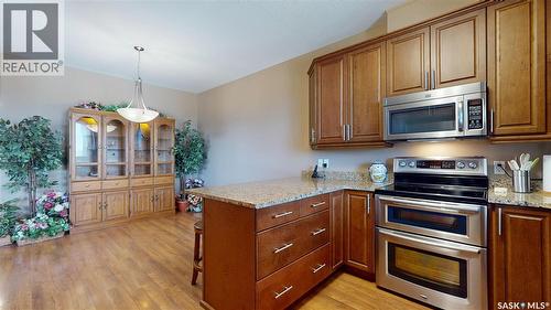 302 3750 Haughton Road E, Regina, SK - Indoor Photo Showing Kitchen