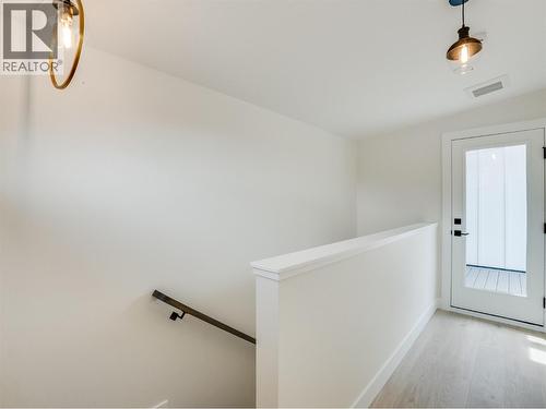 Rooftop patio access - 910 Lakeside Drive Unit# 203, Nelson, BC - Indoor Photo Showing Other Room
