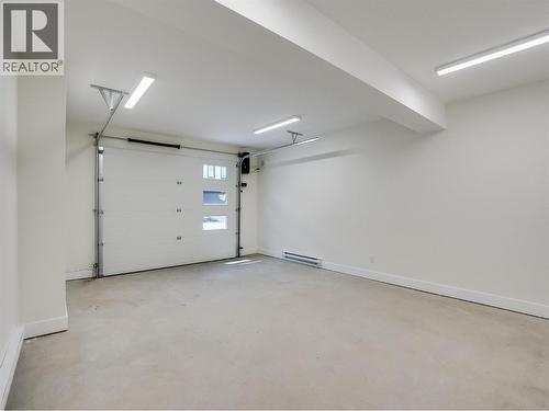 Single garage - 910 Lakeside Drive Unit# 203, Nelson, BC - Indoor Photo Showing Garage