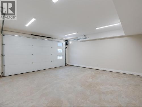Double car garage - 910 Lakeside Drive Unit# 403, Nelson, BC - Indoor Photo Showing Garage