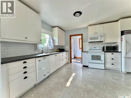 405 March Avenue E, Langenburg, SK - Indoor Photo Showing Kitchen With Double Sink
