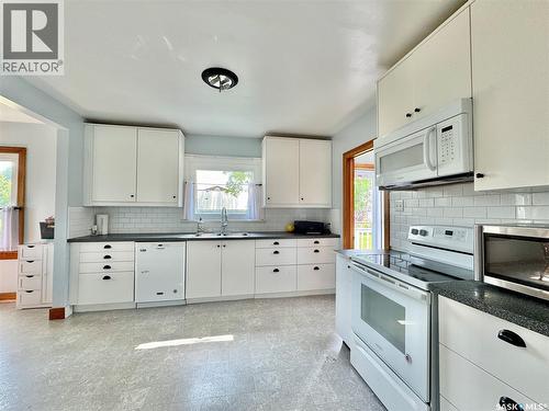 405 March Avenue E, Langenburg, SK - Indoor Photo Showing Kitchen With Double Sink