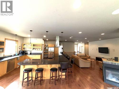 57 Estates Drive, Elk Ridge, SK - Indoor With Fireplace