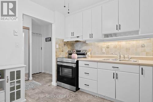 710 - 66 Greenview Drive, Kingston (Central City West), ON - Indoor Photo Showing Kitchen With Double Sink