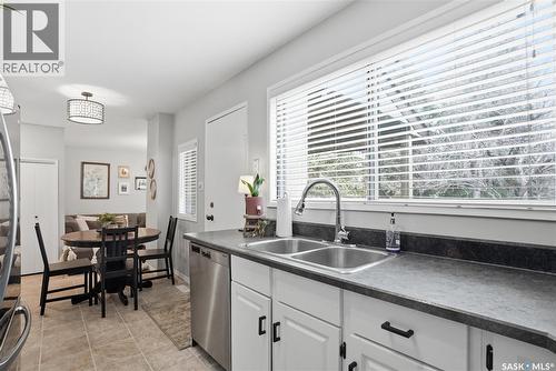 16 425 Pinehouse Drive, Saskatoon, SK - Indoor Photo Showing Kitchen With Double Sink