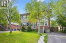 Brick exterior with light-colored siding accents, featuring a front porch with white railing - 87 Barbara Crescent, Kitchener, ON  - Outdoor 