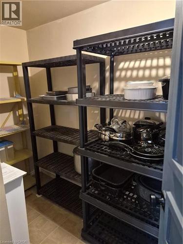 Compact storage area featuring ample shelving - 27 Scenic Wood Crescent, Kitchener, ON - 