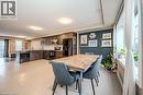 Open-concept kitchen and dining area with light-toned tile flooring - 275 Old Huron Road Unit# 21, Kitchener, ON  - Indoor 