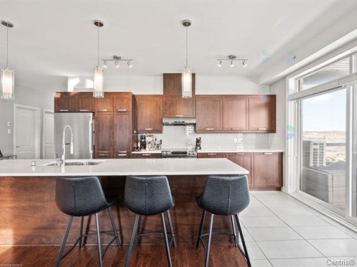 Cuisine - 2340  - 303 Rue Monet, Laval (Duvernay), QC - Indoor Photo Showing Kitchen With Upgraded Kitchen