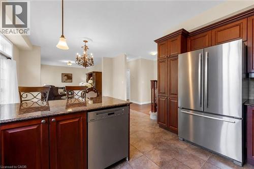 Kitchen with breakfast island, granite countertop, s.s. appliance - 16 Westridge Drive, Hamilton, ON - Indoor Photo Showing Kitchen