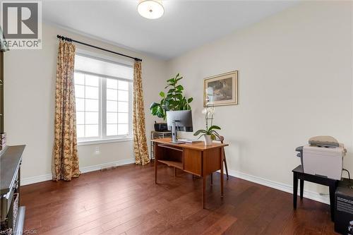Spacious main floor office featuring engineered hardwood flooring and a large multi-pane window. Can be convert to fifth bedroom - 16 Westridge Drive, Hamilton, ON - Indoor Photo Showing Office