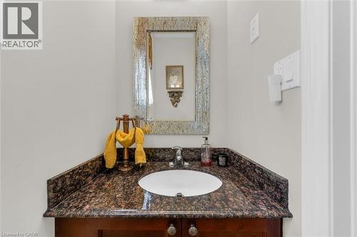 2pc powder room with granite countertop vanity - 16 Westridge Drive, Hamilton, ON - Indoor Photo Showing Bathroom