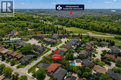 Tucked away between natural tree and green space from the busy meadowlands community. easy highway access - 16 Westridge Drive, Hamilton, ON - Outdoor With View