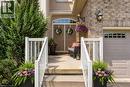 Front entry with concrete porch,  stone and stucco facade, a double door entry - 16 Westridge Drive, Hamilton, ON  - Outdoor 