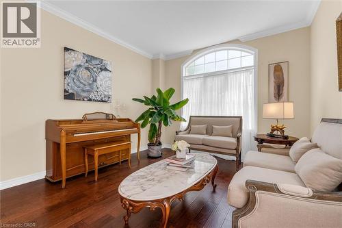 Spacious room featuring anti-slippery engineered flooring , crown molding, nature lights through large windows - 16 Westridge Drive, Hamilton, ON - Indoor Photo Showing Living Room