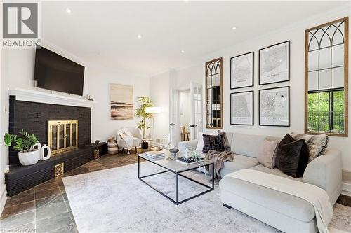 28 Undercliffe Avenue, Hamilton, ON - Indoor Photo Showing Living Room With Fireplace