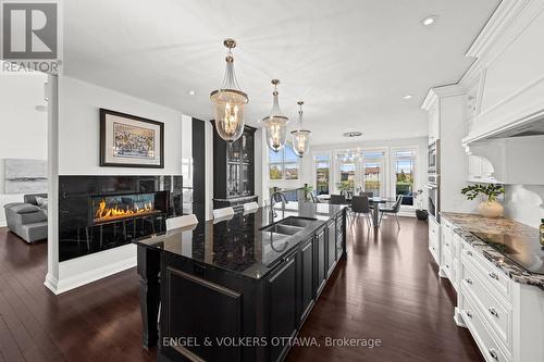 1457 Waters Edge Way, Ottawa, ON - Indoor Photo Showing Kitchen With Fireplace With Double Sink With Upgraded Kitchen