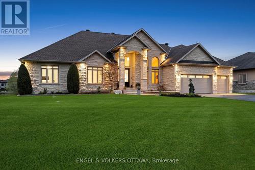 Lawn has been digitally enhanced - 1457 Waters Edge Way, Ottawa, ON - Outdoor With Facade