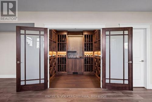 Virtual Staged Wine Cellar - 1457 Waters Edge Way, Ottawa, ON - Indoor Photo Showing Other Room