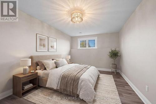 Virtually Staged Lower Level Bedroom - 1457 Waters Edge Way, Ottawa, ON - Indoor Photo Showing Bedroom