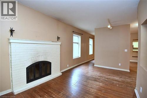 128 Hess Street S, Hamilton, ON - Indoor Photo Showing Living Room With Fireplace