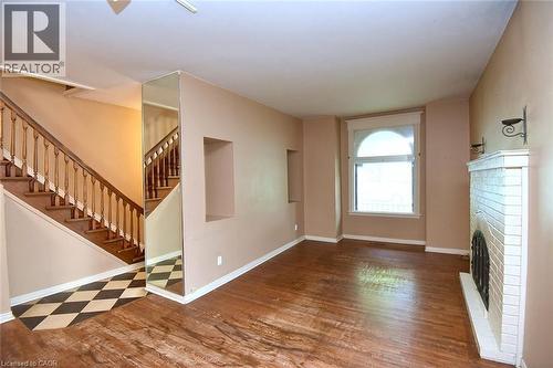 128 Hess Street S, Hamilton, ON - Indoor Photo Showing Other Room With Fireplace