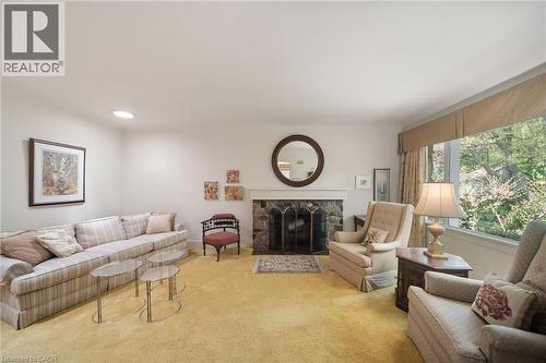 133 Mccall Crescent, Simcoe, ON - Indoor Photo Showing Living Room With Fireplace