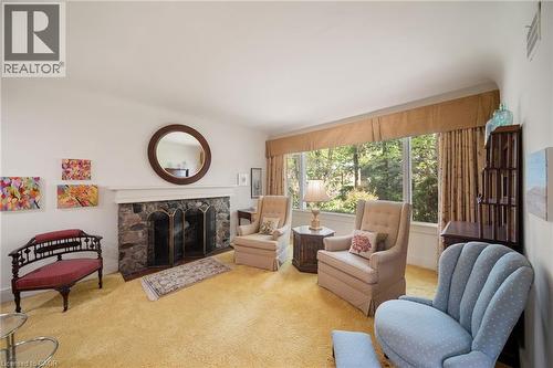 133 Mccall Crescent, Simcoe, ON - Indoor Photo Showing Living Room With Fireplace